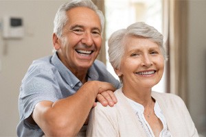 Couple smiling with All-On-4 in Carrollton    