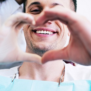 A man making a heart with his hands
