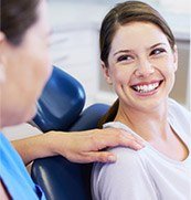 Smiling woman in dental chair