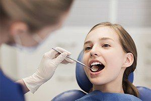 Child receiving dental exam