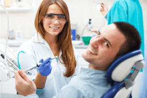 Smiling man in dental chair