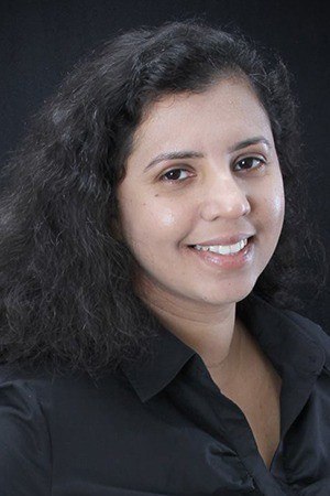 Headshot of Carrollton dentist Dr. Moji Chandy