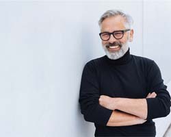 Man smiling with dental implants in Carrollton