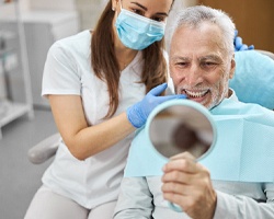 Man smiling with dental implants in Carrollton