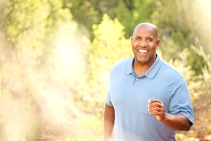 man who is a good candidate for implant dentures in Carrollton