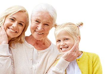 Mother, daughter, and granddaughter smiling together