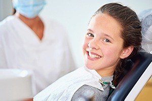 Smiling child in dental chair