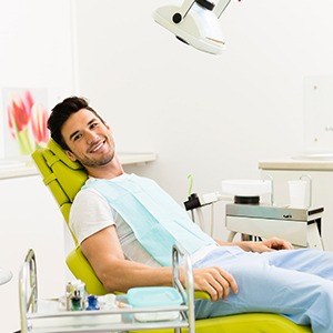 Smiling man in dental chair