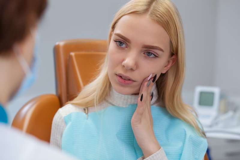 young patient seeing an emergency dentist in Carrollton