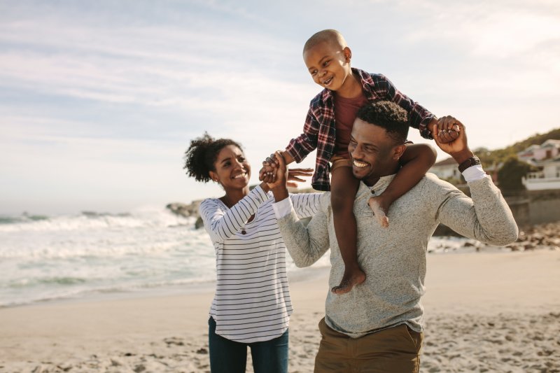 smiling family on a beach