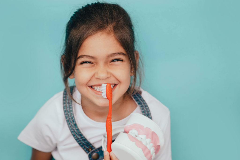 Child brushing their teeth